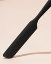 GIR Black Ultimate Spreader on a cream background.