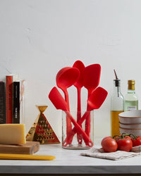 A few tools of the GIR 10 Piece Marinara Best Seller Tool Set in a kitchen setting.