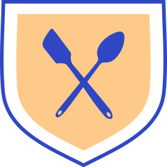 A shield with a spatula and a spoon representing durable material.