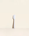 The Studio Ultimate Spatula on a cream background. 