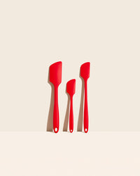 The GIR Red 3 Piece Spatula Set on a cream background.