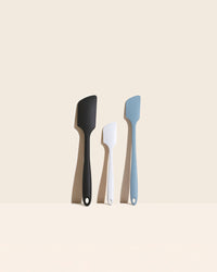 The GIR Black,White & Slate Piece Spatula Set on a cream background.