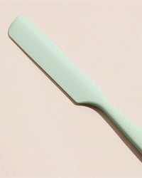 GIR Mint Ultimate Spreader on a cream background.