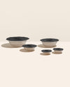 GIR 10 Piece Black Suction Lids on a cream background. 