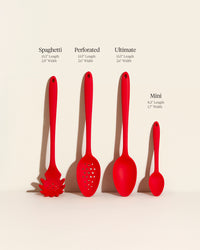The GIR Mini, Ultimate, Perforated Spaghetti Spoon with dimensions on a grey background. 