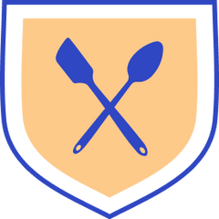 A shield with a spatula and a spoon representing durable material. 