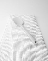 The Studio Spoonula on a White Onsen Towel. 