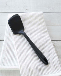 The Black Mini Flip on an Onsen Waffle Hand Towel. 