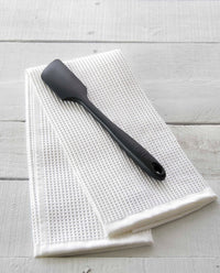 The Black Ultimate Spatula on an Onsen Hand Towel. 