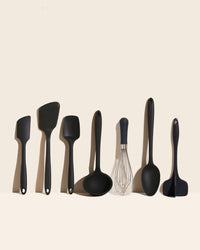 The GIR Black 7 Piece  Ultimate Tool Set on a cream background. 