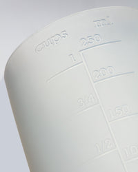 A close up of the GIR Container on a grey background. 