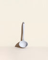 The Studio Ultimate Ladle on a cream background. 