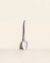 The Studio Ultimate Spoon on a Cream Background. 