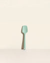 The Mint Ultimate Spoonula on a cream background. 