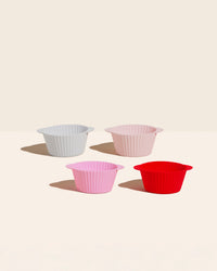 The Strawberry Swirl Cupcake Liners on a cream background. 