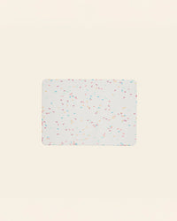 The Sprinkle 9 x 12 Baking mat on a cream background. 