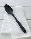 Ultimate Perforated Spoon & Spoon Set displayed against a light background, showcasing two black cooking spoons.